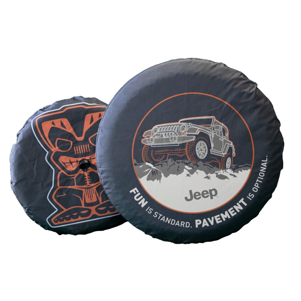 Custom tire covers by American Stitchco, Inc.: Jeep logo and tribal statue decal designs, showcasing automotive sewing craftsmanship.