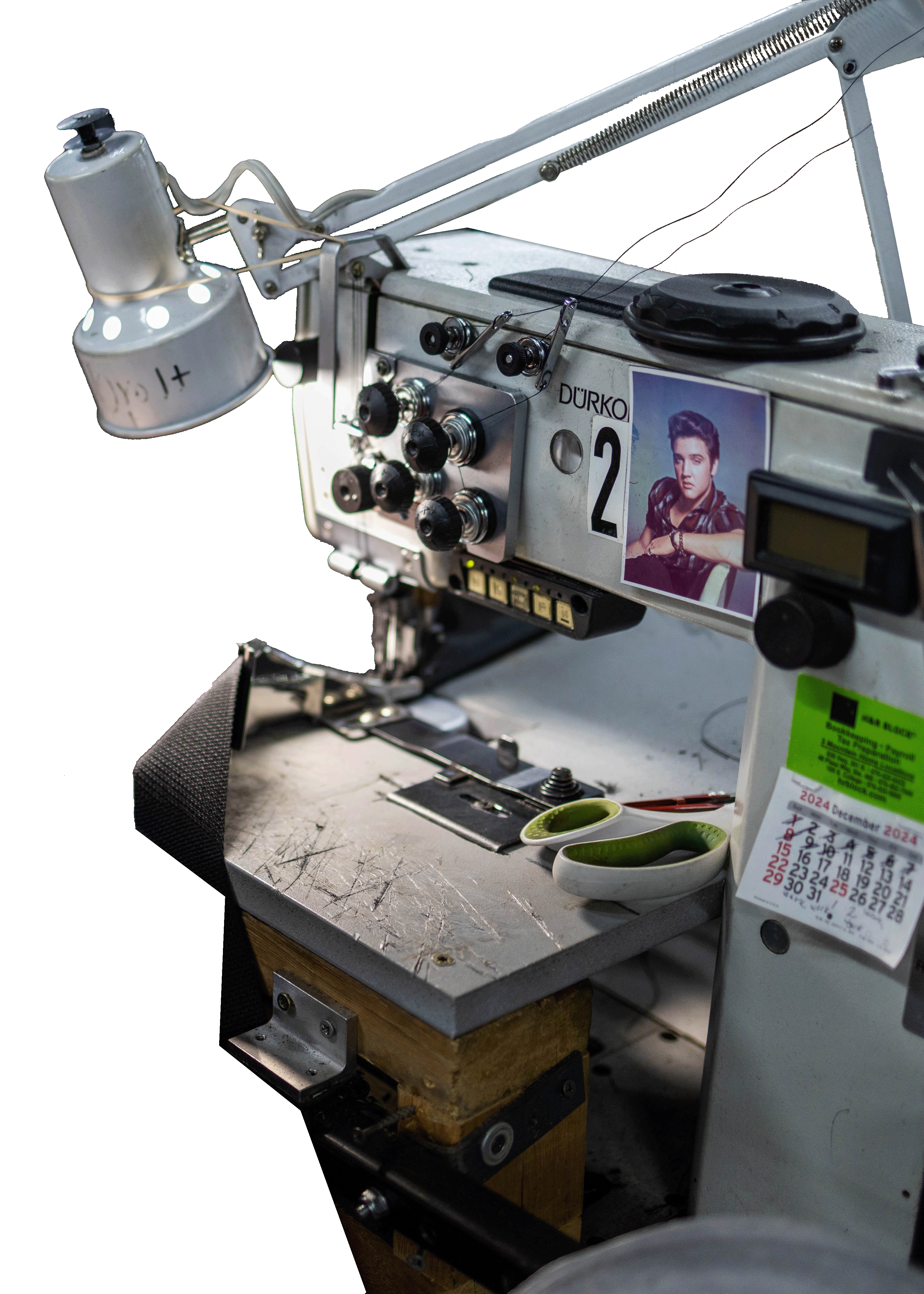 Elvis Presley photo on an industrial sewing machine at one of American Stitchco's sewing factory